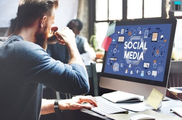A man using computer and drinking coffee I LegalTechMunch
